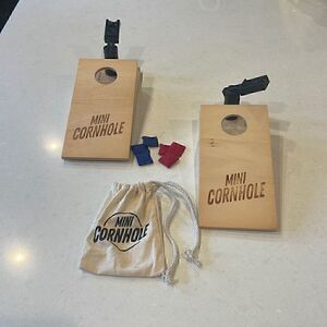 Cornhole mini game, for the kid at heart, shoots  bags quite far,accurately.